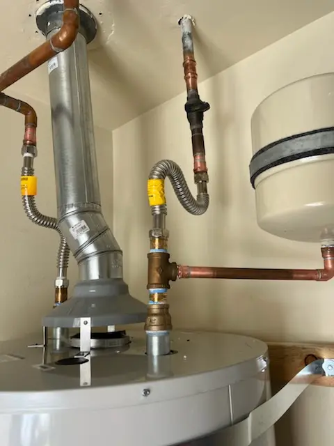 Water heater installation and plumbing repair in Molfait Tracts